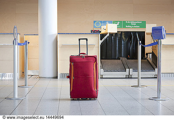 Luggage at an Airline Check-In Counter