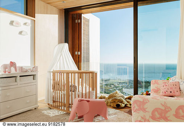 Luxury girl's bedroom with ocean view