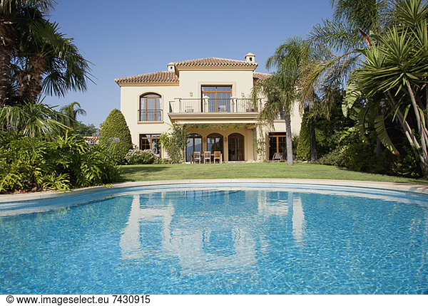 Luxury swimming pool and Spanish villa