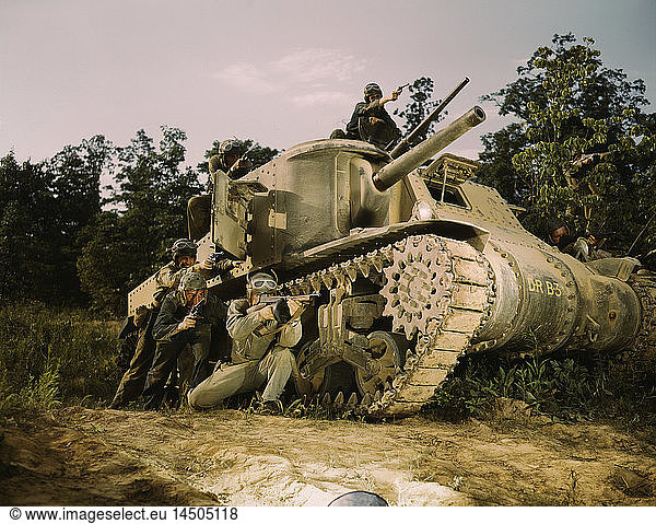 M-3 Tank and Crew using Small Arms  Fort Knox  Kentucky  USA  Alfred T. Palmer for Office of War Information  June 1942