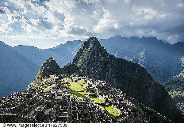 Machu Picchu  the Inca citadel high in the Andes  above the Sacred Valley  plateau with buildings and terraces.