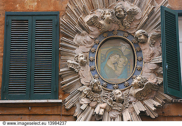 Madonna & Child between Teal Blue Shutters in Rome