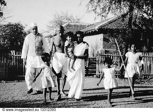 Mahatma Gandhi Walking With His Grand Daughter In Law Saraswati Her