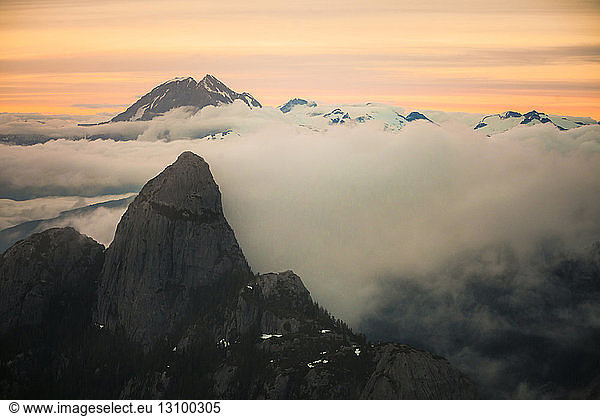 Majestic view of Mount Habrich amidst clouds against dramatic sky during sunset