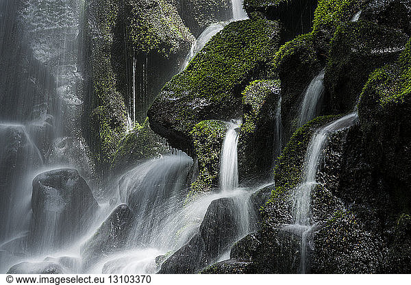 Majestic view of waterfall on rocks at Mount Hood National Forest
