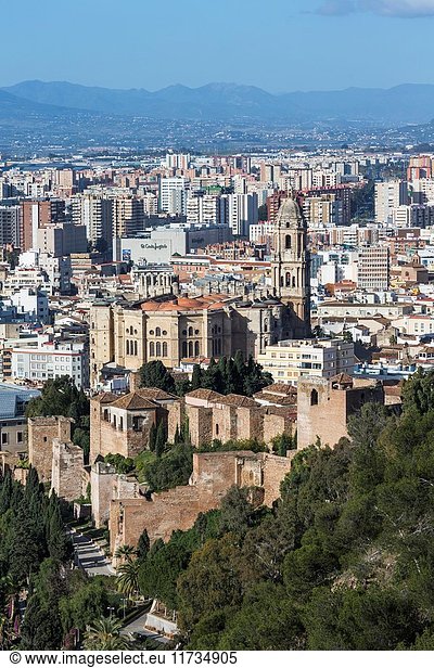 Malaga  Costa del Sol  Malaga Province  Andalusia  southern Spain. Classic view from the Parador Nacional down over the city to the cathedral and walls of the Moorish Alcazaba  or castle. The correct name of the cathedral is Nuestra Señora de la Encarnación (Our Lady of Incarnation) but it's nickname is La Manquita (the One-Armed) because of its missing tower.