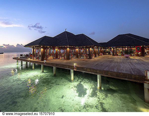 Maldives  Coastal restaurant on South Male Atoll at dusk