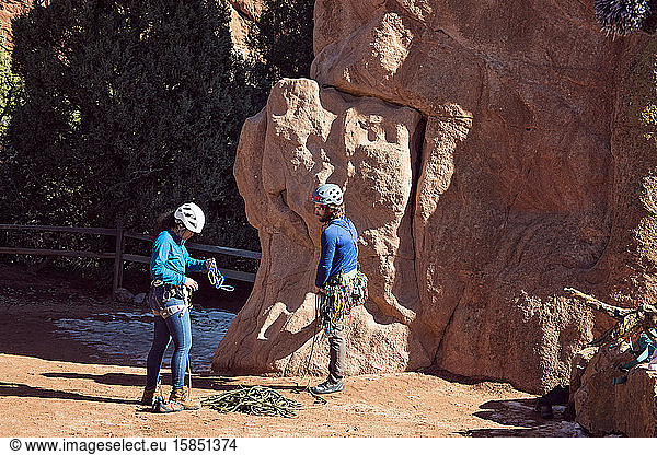 Male and Asian Female Rock Climbers at Garden of the Gods Colorado