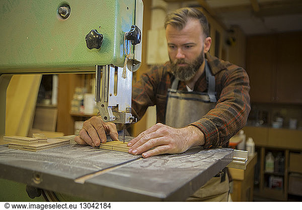 Male carpenter working in workshop