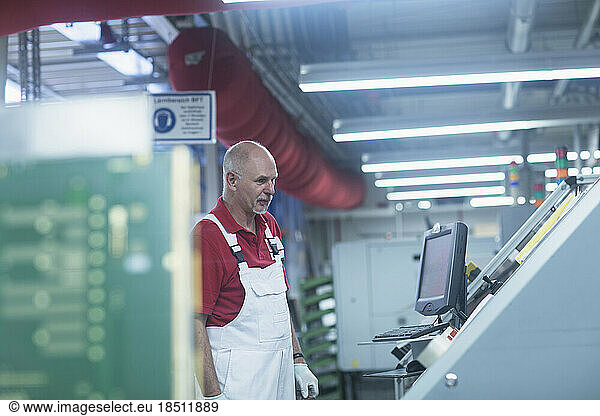 Male engineer working in industry  Hanover  Lower Saxony  Germany