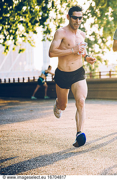 Male Running In The Park