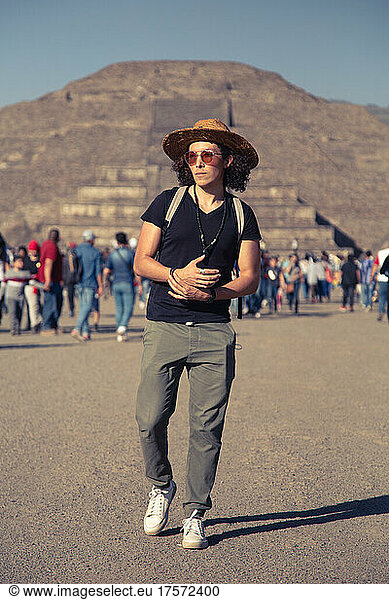 Male wearing sunglasses and hat  walking around Teotihuacan