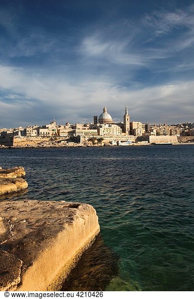 Malta  Valletta  skyline with St Paul´s Anglican Cathedral and Carmelite Church from Sliema  sunset