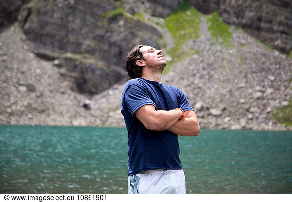 Man breathing in fresh air,  Cathedral Lake,  Aspen,  Colorado