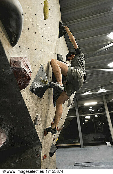Man climbing in a climbing gym