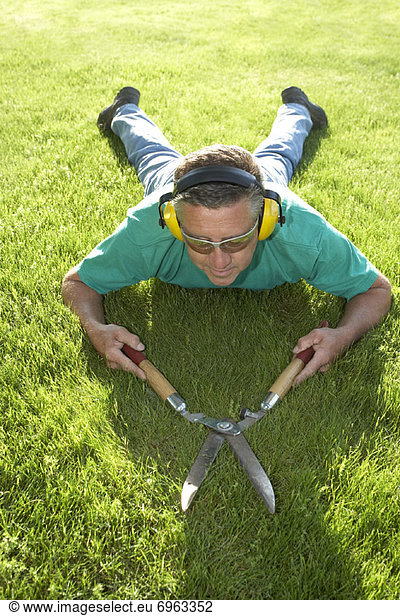 Man Cutting Grass