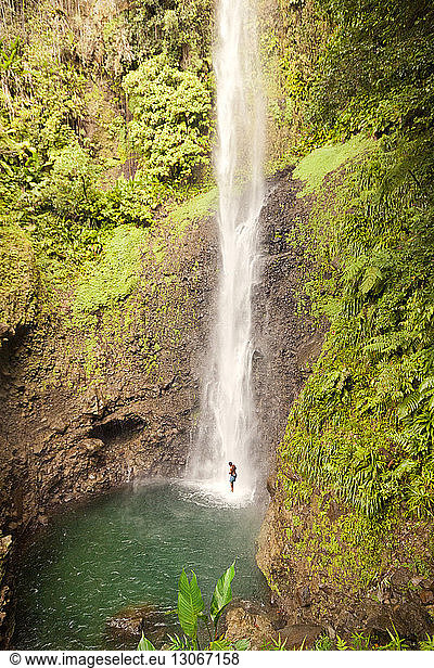 Man enjoying at waterfall