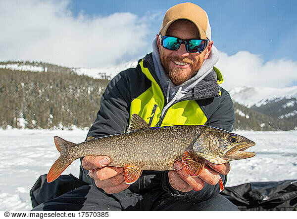 Man Grip and Grin with lake trout