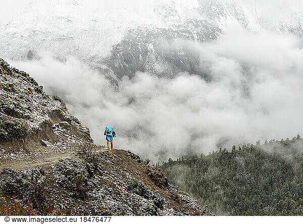 Man hiking on mountain at Annapurna Circuit in Nepal