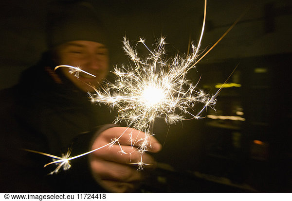 Man holding sparkle