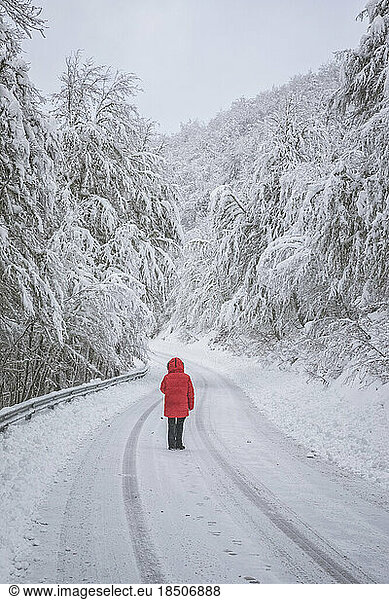 Man in a snow road