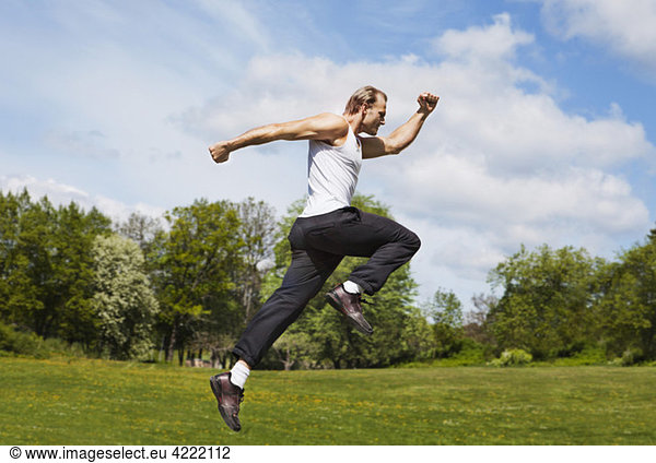 Man in the middle of jump