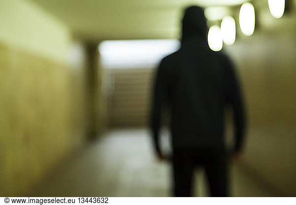 Man in tunnel (violence symbol photo)