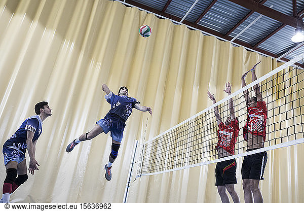 Man jumping during a volleyball match