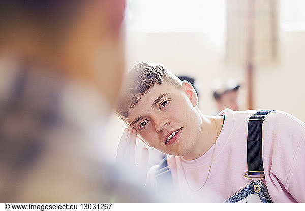 Man listening in group therapy