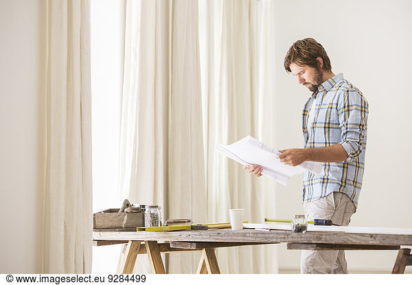 Man looking through documents