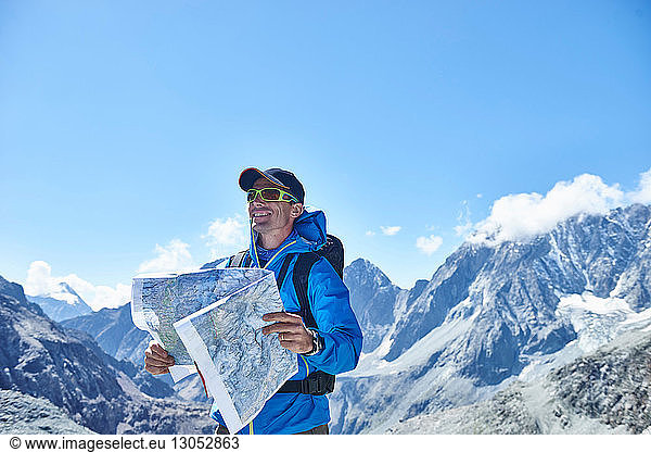 Man reading map  Mont Cervin  Matterhorn  Valais  Switzerland