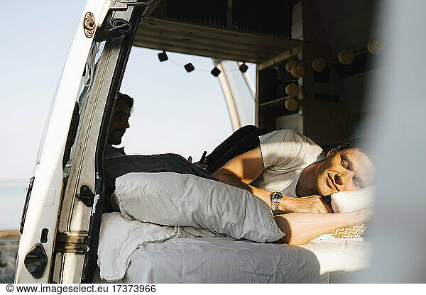 Man resting in motor home during summer vacation