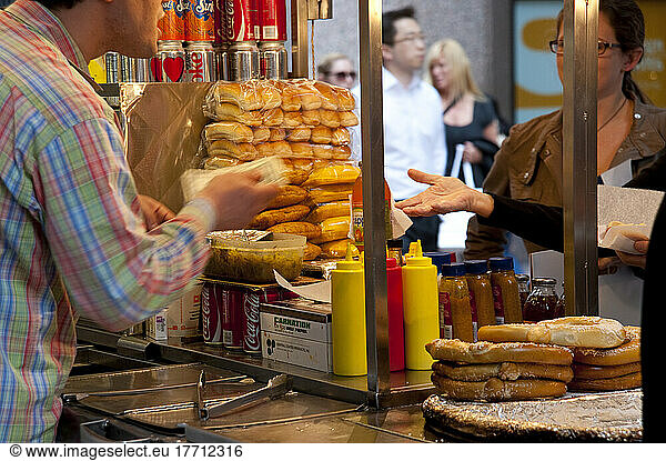 Man Selling Hot Dogs In Midtown Manhattan  New York  Usa