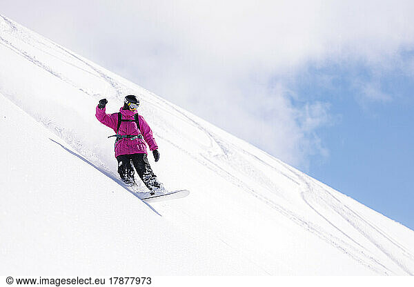 Man snowboarding on ski slope