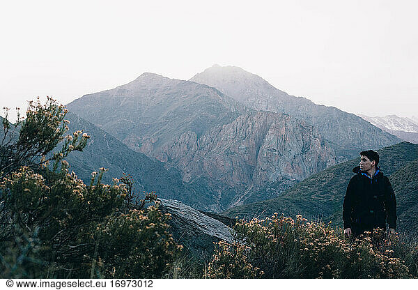 Man Standing Contempling Mountain Landscape. Argentina