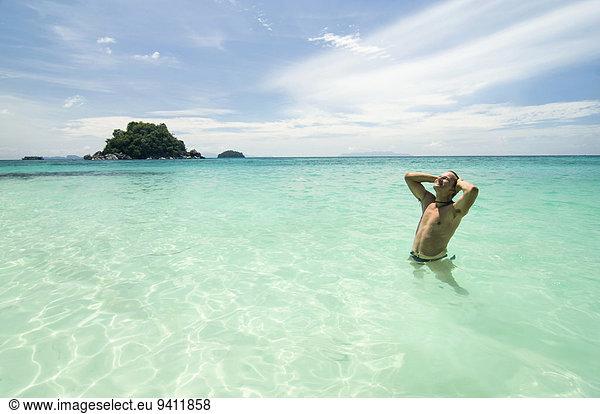man standing in the ocean  Koh Lipe  Thailand