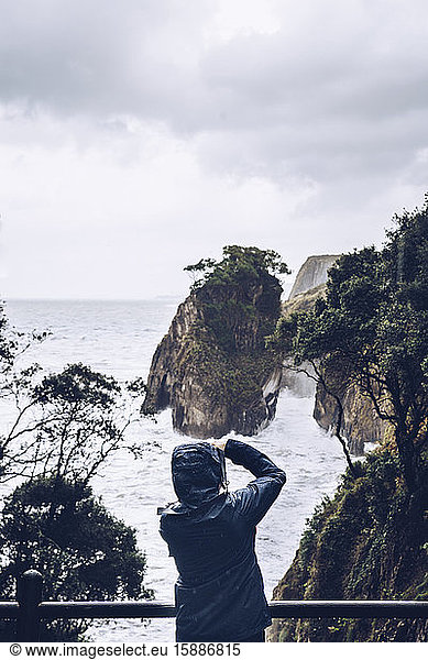 Man taking photos on a cliff  Pindal  Spin