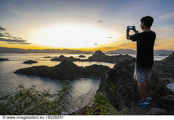 Man taking picture at east Nusa Tenggara island in Komodo