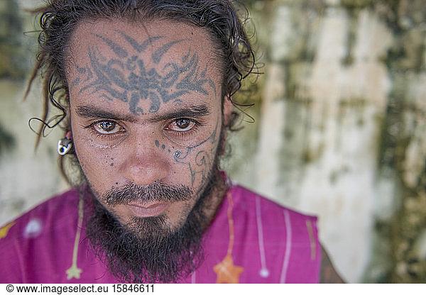 Man tattooed in the face