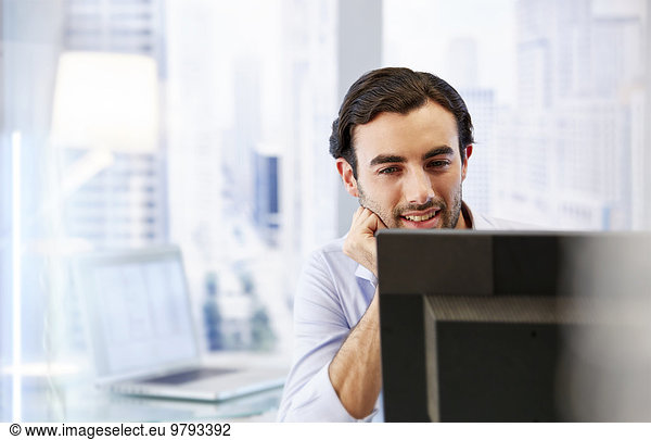 Man using computer in office