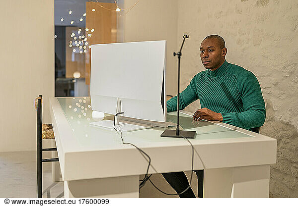 Man using computer working from home