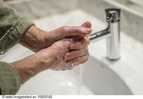 Man wahing hands  close up