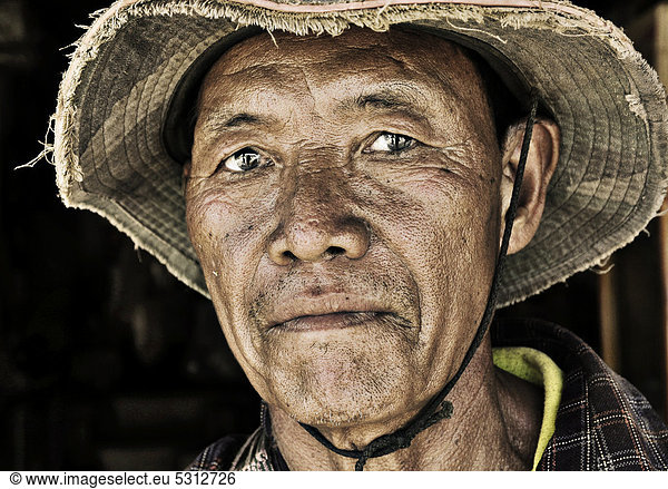 Man wearing a hat  portrait  Laos  Southeast Asia  Asia