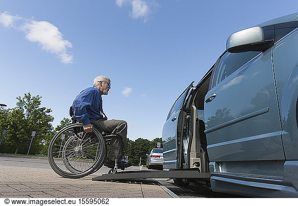 Man with muscular dystrophy and diabetes getting in an accessible van