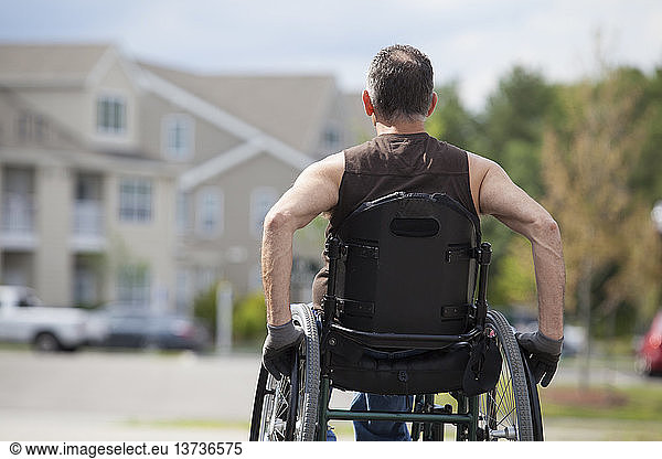 Man with spinal cord injury sitting in a wheelchair