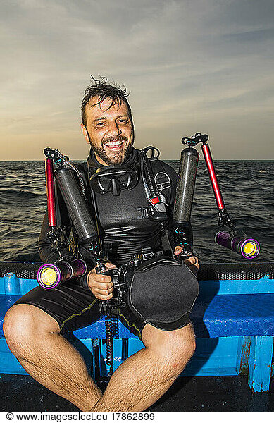 man with underwater camera at Tubbataha reef