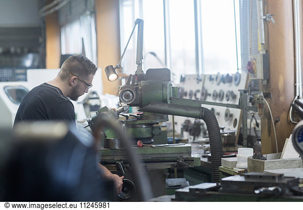 Man working in grinding workshop