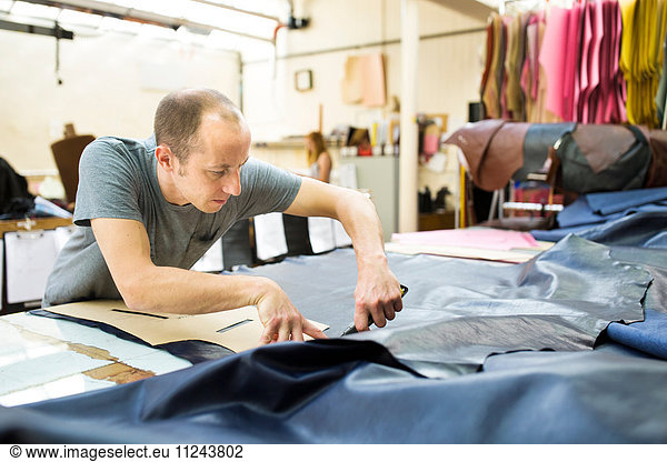 Man working in leather jacket manufacturers