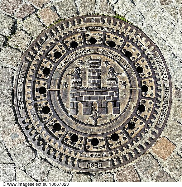 Manhole cover with coat of arms of the city of Freiburg im Breisgau  Baden-Württemberg  Germany  Europe