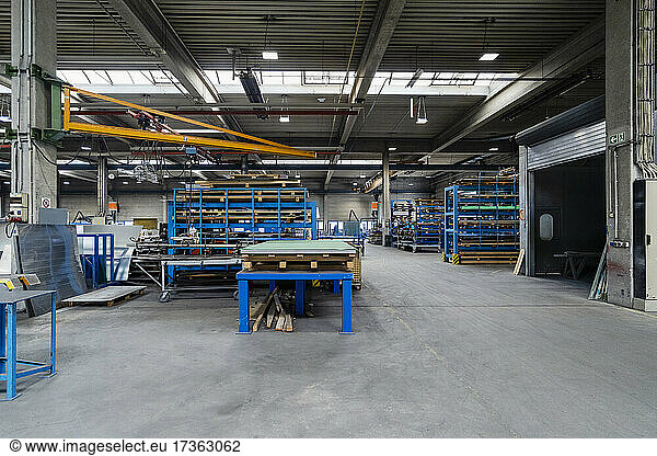 Manufacturing equipment and workbench in factory